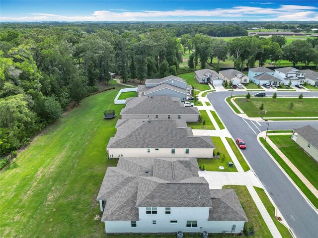 7067 SW 60th Ln, Ocala, FL 34474 - aerial perspective of suburban area featuring a heavily wooded area