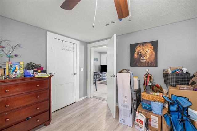 1330 NE 55th St, Ocala, FL 34479 - bedroom featuring light wood-style floors and a ceiling fan
