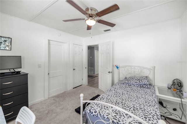 1330 NE 55th St, Ocala, FL 34479 - bedroom featuring carpet floors and ceiling fan