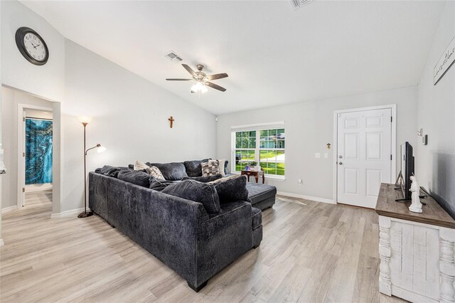 6 Sequoia Loop, Ocklawaha, FL 32179 - living room with ceiling fan, light wood finished floors, and vaulted ceiling