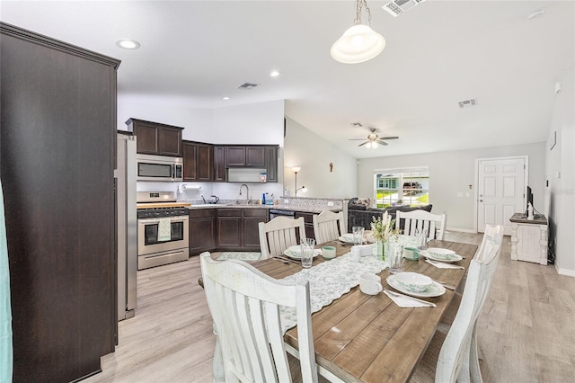 6 Sequoia Loop, Ocklawaha, FL 32179 - dining space featuring lofted ceiling, ceiling fan, and light wood finished floors