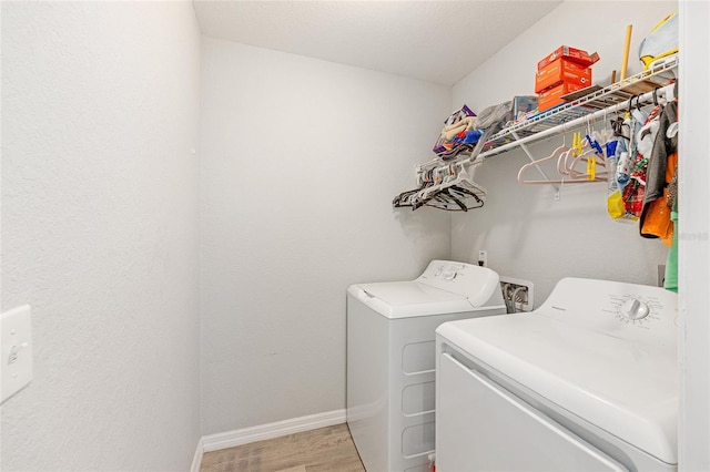 6 Sequoia Loop, Ocklawaha, FL 32179 - washroom with independent washer and dryer and light wood-type flooring