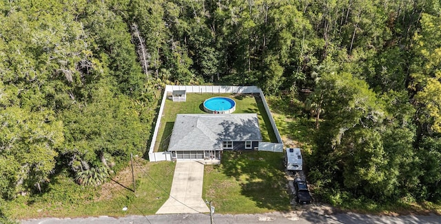 6 Sequoia Loop, Ocklawaha, FL 32179 - view of subject property with a heavily wooded area