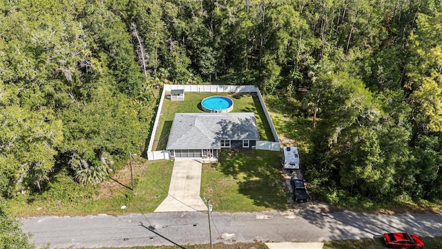 6 Sequoia Loop, Ocklawaha, FL 32179 - view of subject property with a heavily wooded area