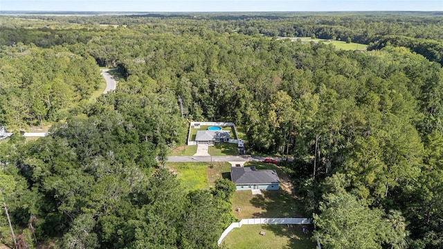 6 Sequoia Loop, Ocklawaha, FL 32179 - view of property location featuring a heavily wooded area