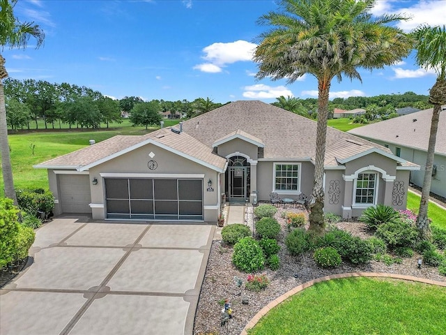 1443 SW 161st St, Ocala, FL 34473 - ranch-style house featuring stucco siding, an attached garage, driveway, a front yard, and a shingled roof