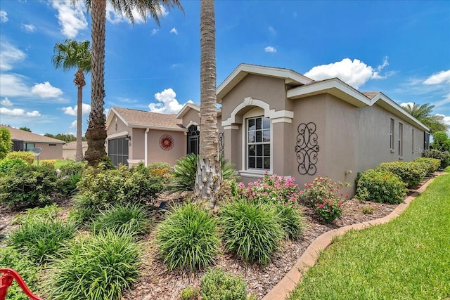 1443 SW 161st St, Ocala, FL 34473 - view of front of house featuring stucco siding