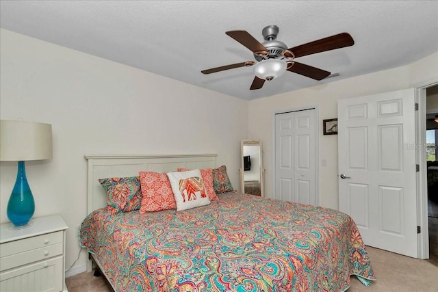 1443 SW 161st St, Ocala, FL 34473 - bedroom with light carpet, a closet, and ceiling fan