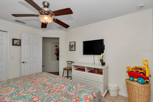 1443 SW 161st St, Ocala, FL 34473 - bedroom featuring a ceiling fan and light colored carpet