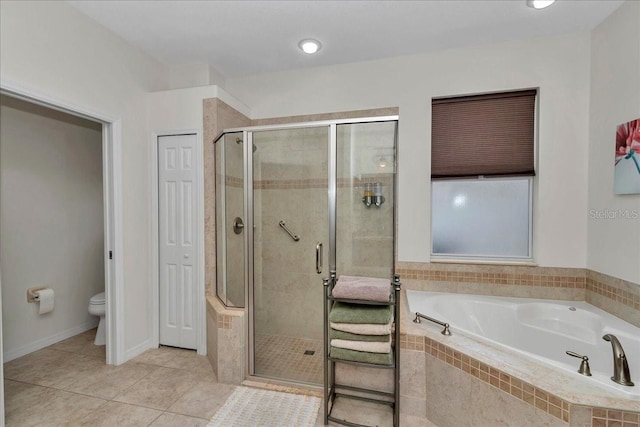 1443 SW 161st St, Ocala, FL 34473 - bathroom with a bath, a shower stall, and tile patterned floors