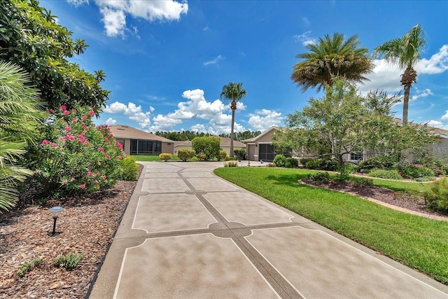 1443 SW 161st St, Ocala, FL 34473 - view of home's community featuring a yard