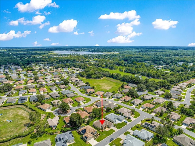 9120 SE 125th Loop, Summerfield, FL 34491 - aerial view of residential area with a large body of water