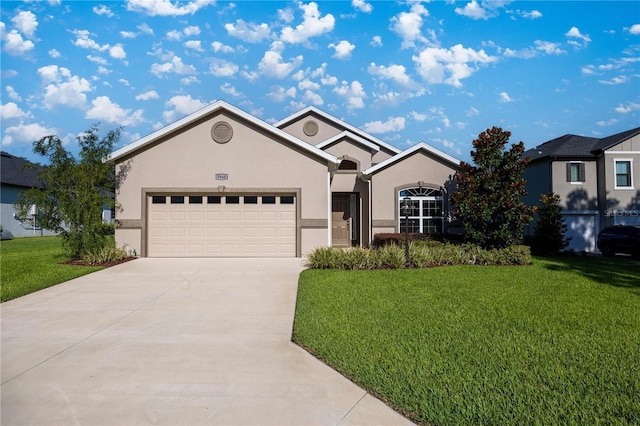 3948 SE 4th Ter, Ocala, FL 34480 - single story home featuring driveway, a front yard, an attached garage, and stucco siding