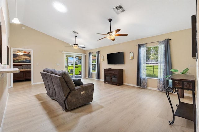 12178 SE 174th Pl, Summerfield, FL 34491 - living area with light wood finished floors, lofted ceiling, and ceiling fan