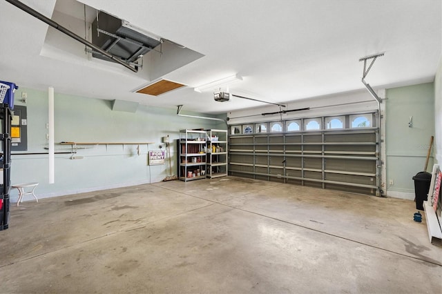 12178 SE 174th Pl, Summerfield, FL 34491 - garage featuring a garage door opener