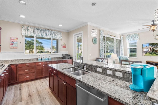 9926 SW 95th Loop, Ocala, FL 34481 - kitchen with dishwasher, light wood finished floors, light stone counters, crown molding, and a textured ceiling