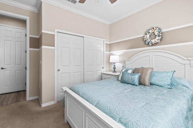 9926 SW 95th Loop, Ocala, FL 34481 - carpeted bedroom with a closet, ceiling fan, and ornamental molding