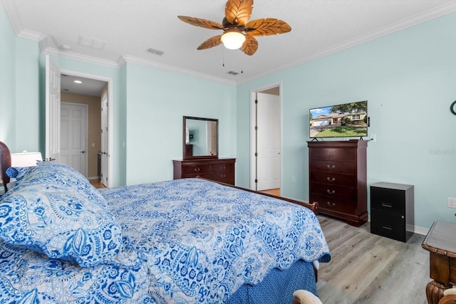 9926 SW 95th Loop, Ocala, FL 34481 - bedroom with light wood-type flooring, ornamental molding, and ceiling fan