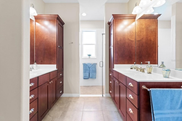 9926 SW 95th Loop, Ocala, FL 34481 - bathroom featuring two vanities, a stall shower, and tile patterned flooring
