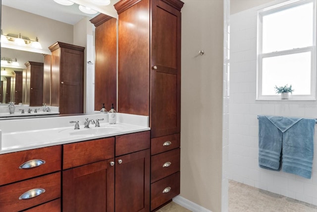 9926 SW 95th Loop, Ocala, FL 34481 - bathroom featuring vanity and a tile shower