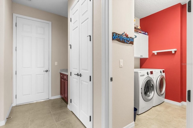 9926 SW 95th Loop, Ocala, FL 34481 - laundry area with cabinet space, independent washer and dryer, and light tile patterned floors