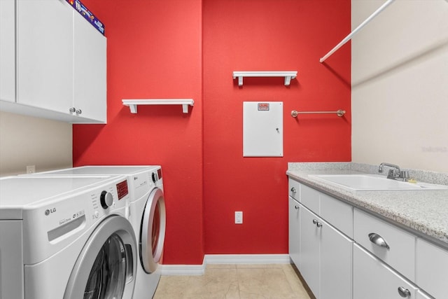 9926 SW 95th Loop, Ocala, FL 34481 - laundry room with cabinet space, washer and dryer, and light tile patterned flooring