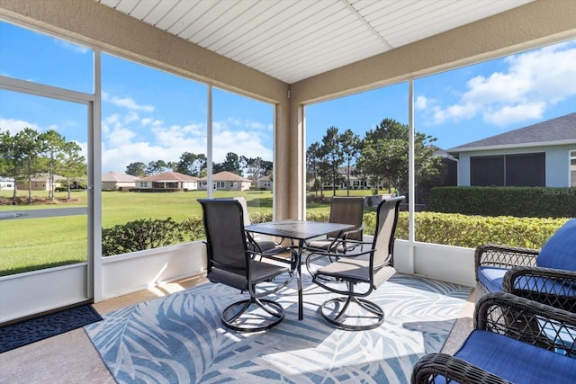 9926 SW 95th Loop, Ocala, FL 34481 - sunroom / solarium featuring outdoor dining area