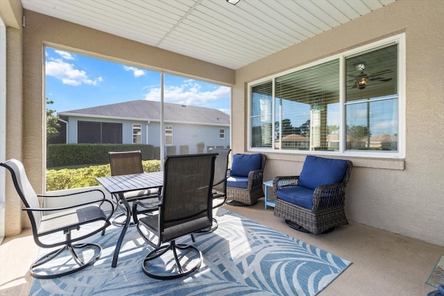 9926 SW 95th Loop, Ocala, FL 34481 - sunroom with plenty of natural light, outdoor dining area, and a ceiling fan