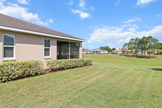 9926 SW 95th Loop, Ocala, FL 34481 - view of green lawn featuring a residential view