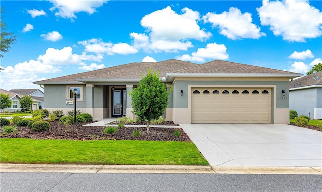 10597 SW 90th Street Rd, Ocala, FL 34481 - ranch-style house featuring stucco siding, concrete driveway, an attached garage, and a front lawn
