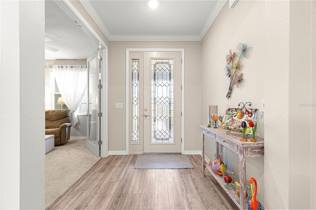 10597 SW 90th Street Rd, Ocala, FL 34481 - entrance foyer with wood finished floors and ornamental molding