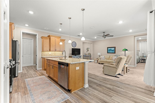 10597 SW 90th Street Rd, Ocala, FL 34481 - kitchen featuring stainless steel appliances, ceiling fan, open floor plan, recessed lighting, and an island with sink