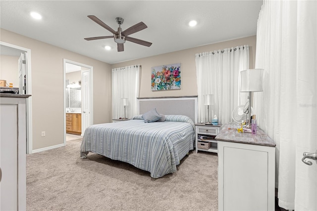 10597 SW 90th Street Rd, Ocala, FL 34481 - bedroom with light carpet, recessed lighting, connected bathroom, and ceiling fan