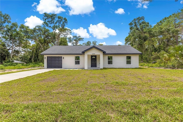 14876 SE 34th Ter, Summerfield, FL 34491 - view of front of property with an attached garage, concrete driveway, stucco siding, and a front yard