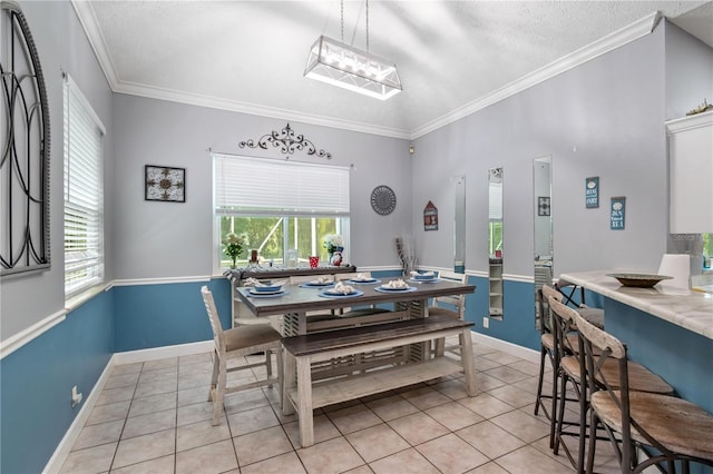 3549 SE 41st Pl, Ocala, FL 34480 - dining space featuring light tile patterned floors, plenty of natural light, ornamental molding, a textured ceiling, and a chandelier