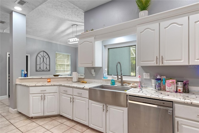 3549 SE 41st Pl, Ocala, FL 34480 - kitchen featuring stainless steel dishwasher, light tile patterned floors, white cabinetry, ornamental molding, and a peninsula