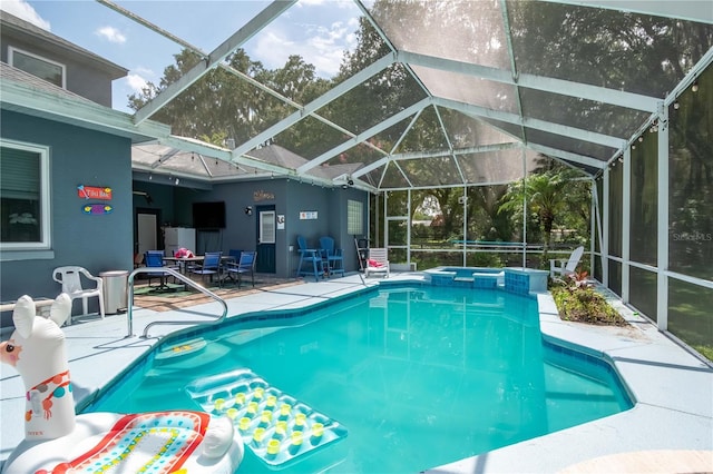3549 SE 41st Pl, Ocala, FL 34480 - view of pool featuring a patio, a pool with connected hot tub, and glass enclosure