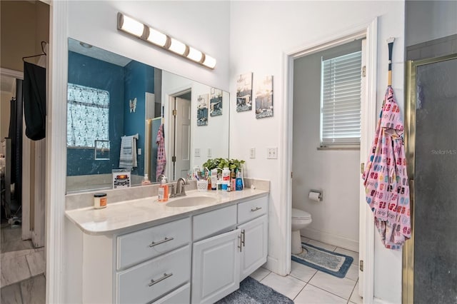 3549 SE 41st Pl, Ocala, FL 34480 - bathroom with vanity, tile patterned floors, and a shower