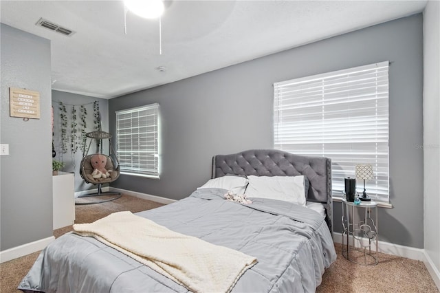 3549 SE 41st Pl, Ocala, FL 34480 - carpeted bedroom featuring a ceiling fan and multiple windows