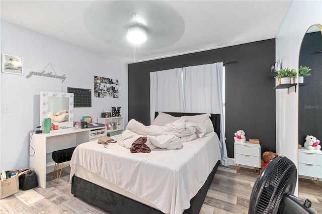 3549 SE 41st Pl, Ocala, FL 34480 - bedroom featuring light wood-style floors and ceiling fan
