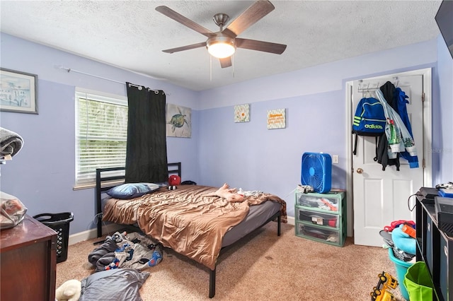 3549 SE 41st Pl, Ocala, FL 34480 - carpeted bedroom with a ceiling fan and a textured ceiling
