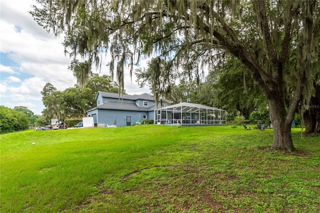 3549 SE 41st Pl, Ocala, FL 34480 - view of grassy yard featuring glass enclosure