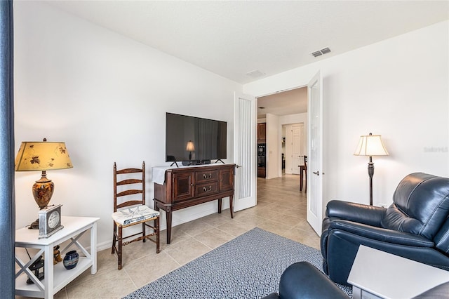 9222 SW 97th Cir, Ocala, FL 34481 - living area with light tile patterned flooring and baseboards