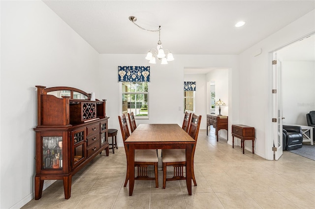 9222 SW 97th Cir, Ocala, FL 34481 - dining area featuring a chandelier, light tile patterned floors, and recessed lighting