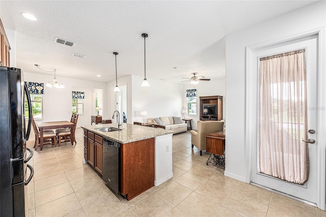 9222 SW 97th Cir, Ocala, FL 34481 - kitchen with black appliances, light tile patterned flooring, hanging light fixtures, a ceiling fan, and recessed lighting