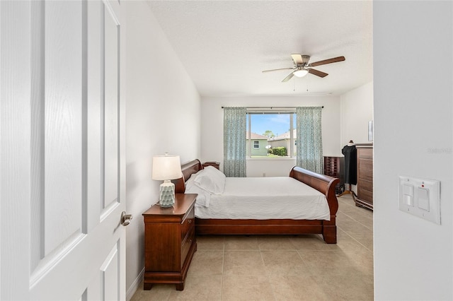 9222 SW 97th Cir, Ocala, FL 34481 - bedroom with light tile patterned floors and ceiling fan
