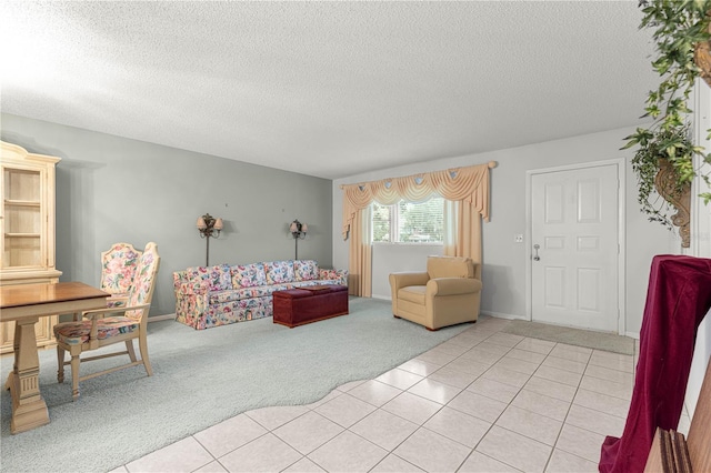 8830 SW 98th Pl Unit M, Ocala, FL 34481 - living area featuring light carpet, a textured ceiling, and light tile patterned floors