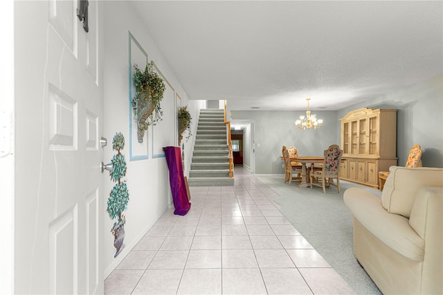 8830 SW 98th Pl Unit M, Ocala, FL 34481 - entrance foyer featuring stairway, light tile patterned floors, and a chandelier