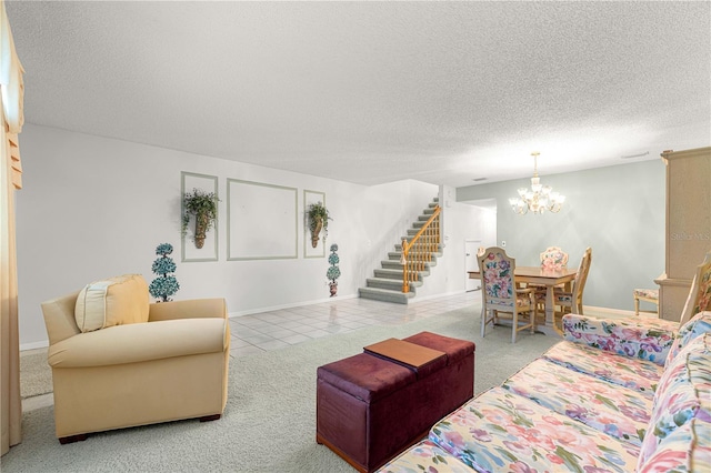 8830 SW 98th Pl Unit M, Ocala, FL 34481 - carpeted living area featuring stairway, a textured ceiling, a chandelier, and tile patterned floors