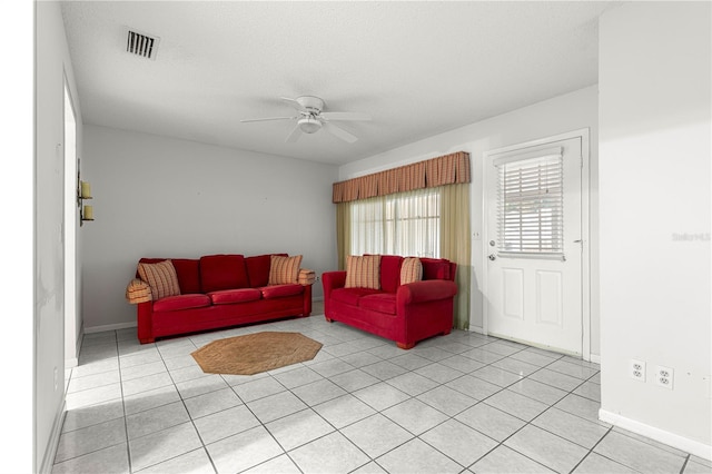8830 SW 98th Pl Unit M, Ocala, FL 34481 - living area featuring a ceiling fan and light tile patterned flooring